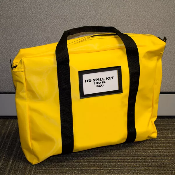 Bright yellow durable zippered Hazardous Drug Spill Kit Supply Bag with black straps and label | Maxpert Medical